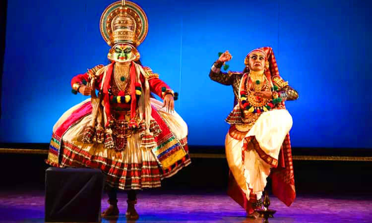Kathakali dancer Kerala green makeup traditional performance